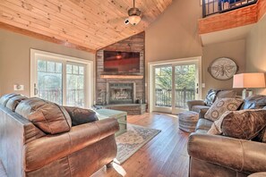 TV, fireplace, books