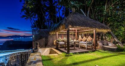 Deluxe Room with Balcony and Ocean View | The Village of Angels Resort