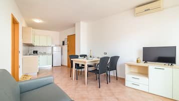 Apartment, 2 Bedrooms, Balcony | Living area | 30-inch flat-screen TV with satellite channels, TV