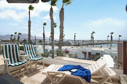 Apartment "Puerto Chico 8" with Sea View, Shared Pool, Terrace & Wi-Fi