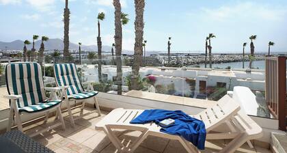 Apartment "Puerto Chico 8" with Sea View, Shared Pool, Terrace & Wi-Fi