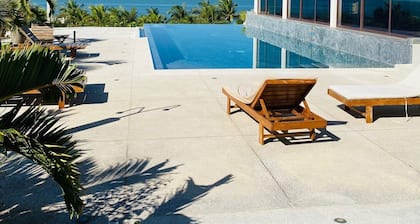 Villa de luxe 3 CH, jardin tropical, bord de plage et piscine commune