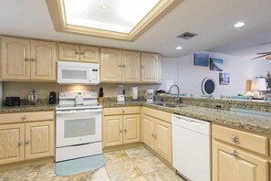 Condo, 2 Bedrooms | Private kitchen - Suntide II 208 by Padre Island Rentals (South Padre Island)