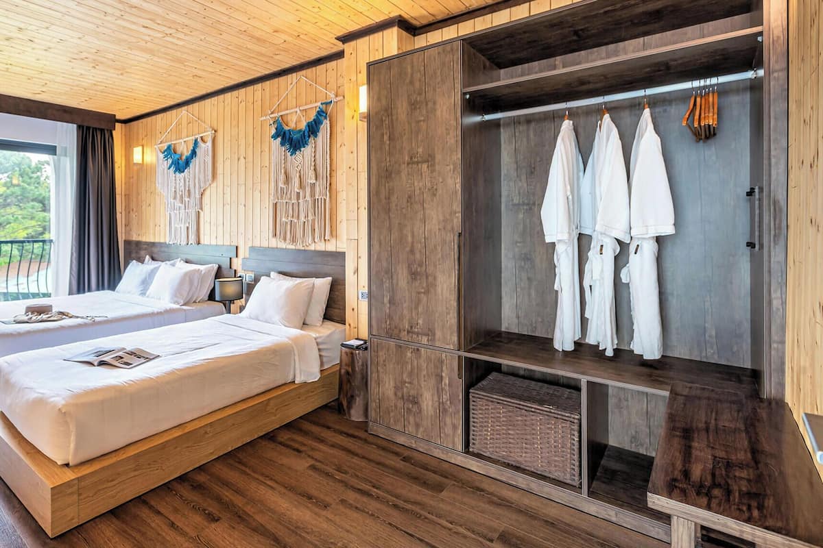 Triple Room, City View | Premium bedding, minibar, in-room safe, desk