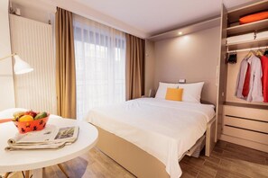 Departamento, 1 cama Queen size | 1 habitación, tabla de planchar con plancha, wifi gratis y ropa de cama 