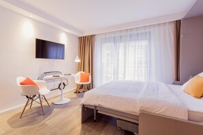 Departamento, 1 cama Queen size | 1 habitación, tabla de planchar con plancha, wifi gratis y ropa de cama 