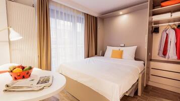 Apartment, 1 Queen Bed | 1 bedroom, iron/ironing board, free WiFi, bed sheets