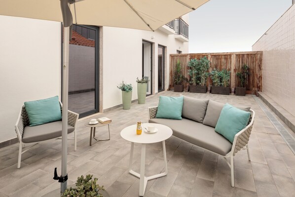 Suite, 1 King Bed, Terrace (Lapa) | Minibar, in-room safe, blackout drapes, iron/ironing board