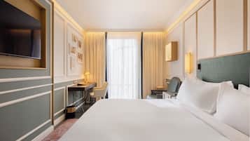 Chambre Deluxe, 1 très grand lit | Minibar, coffres-forts dans les chambres, rideaux occultants