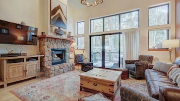 Smart TV, fireplace, DVD player, books