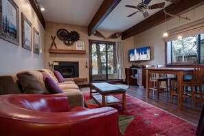 TV, fireplace - CB220 | Lovely Corner Condo | Winter Shuttle | Pool | Hot Tub | Ski In/Out (Steamboat Springs)