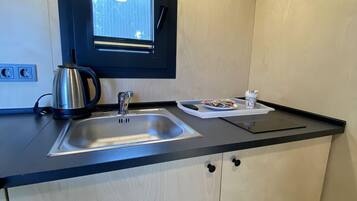 Family Cabin | Private kitchen | Highchair