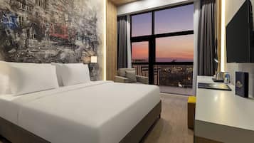 Premium bedding, minibar, in-room safe, laptop workspace