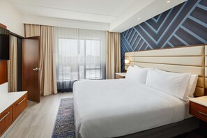 Suite, 1 letto king | Minibar, una cassaforte in camera, ferro/asse da stiro