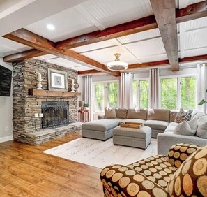 Smart TV, fireplace, books