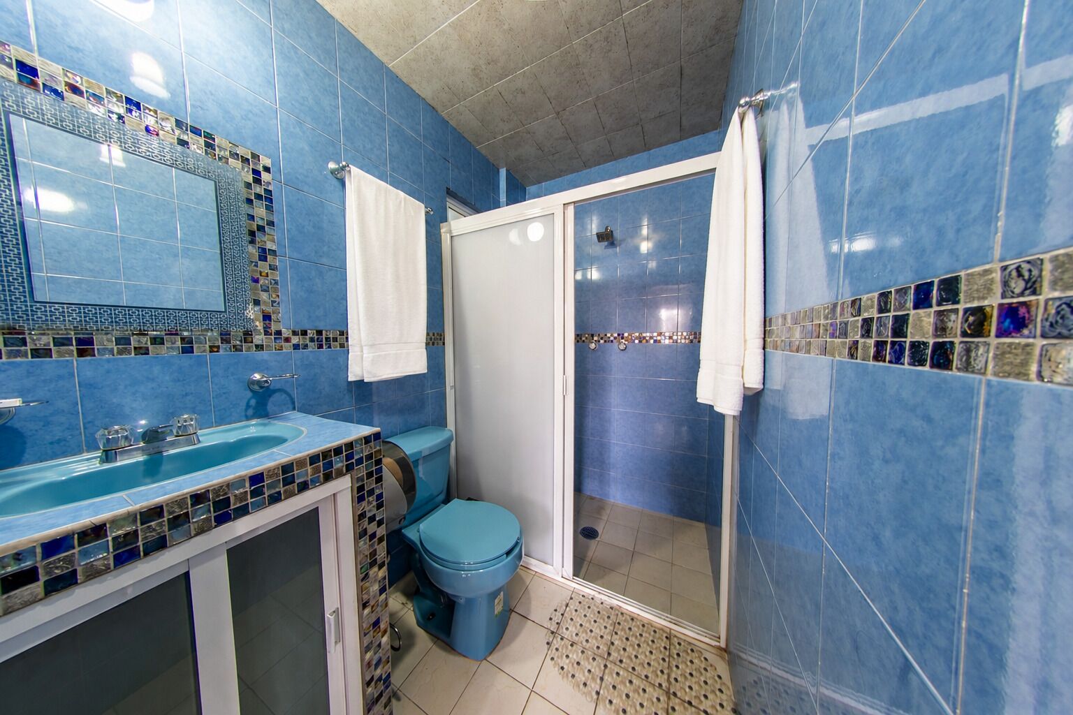 Shower, jetted tub, towels, soap