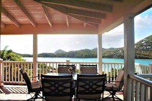 Outdoor dining - Elysium Villa-Secluded Ocean View with a Pool! (Fish Bay)