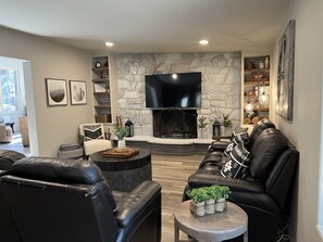 Smart TV, fireplace, foosball, table tennis