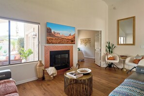 Smart TV, fireplace, table tennis, books