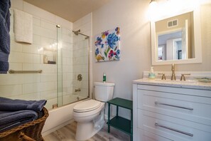 Combined shower/bathtub, hair dryer, towels, soap