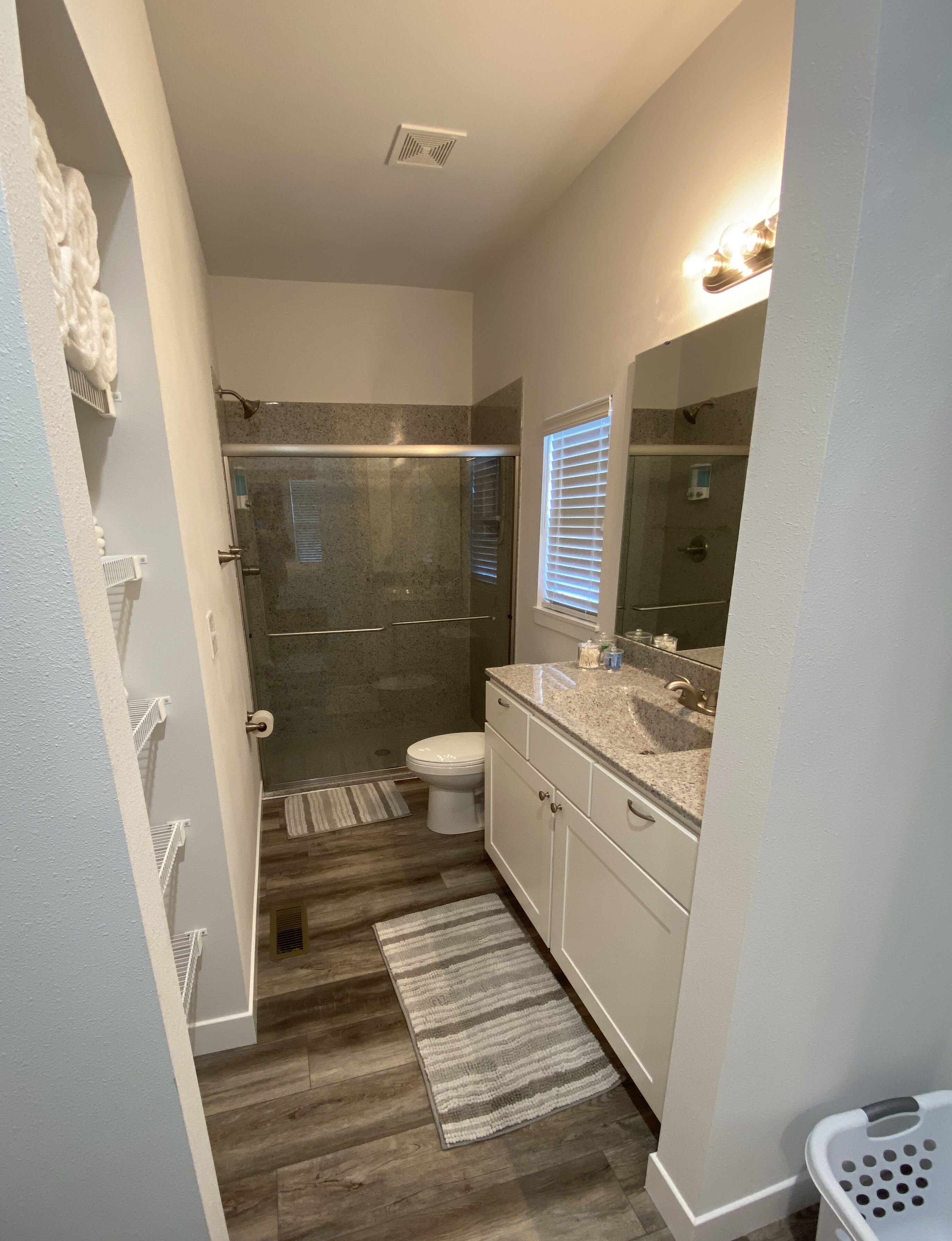Combined shower/tub, hair dryer, towels, soap
