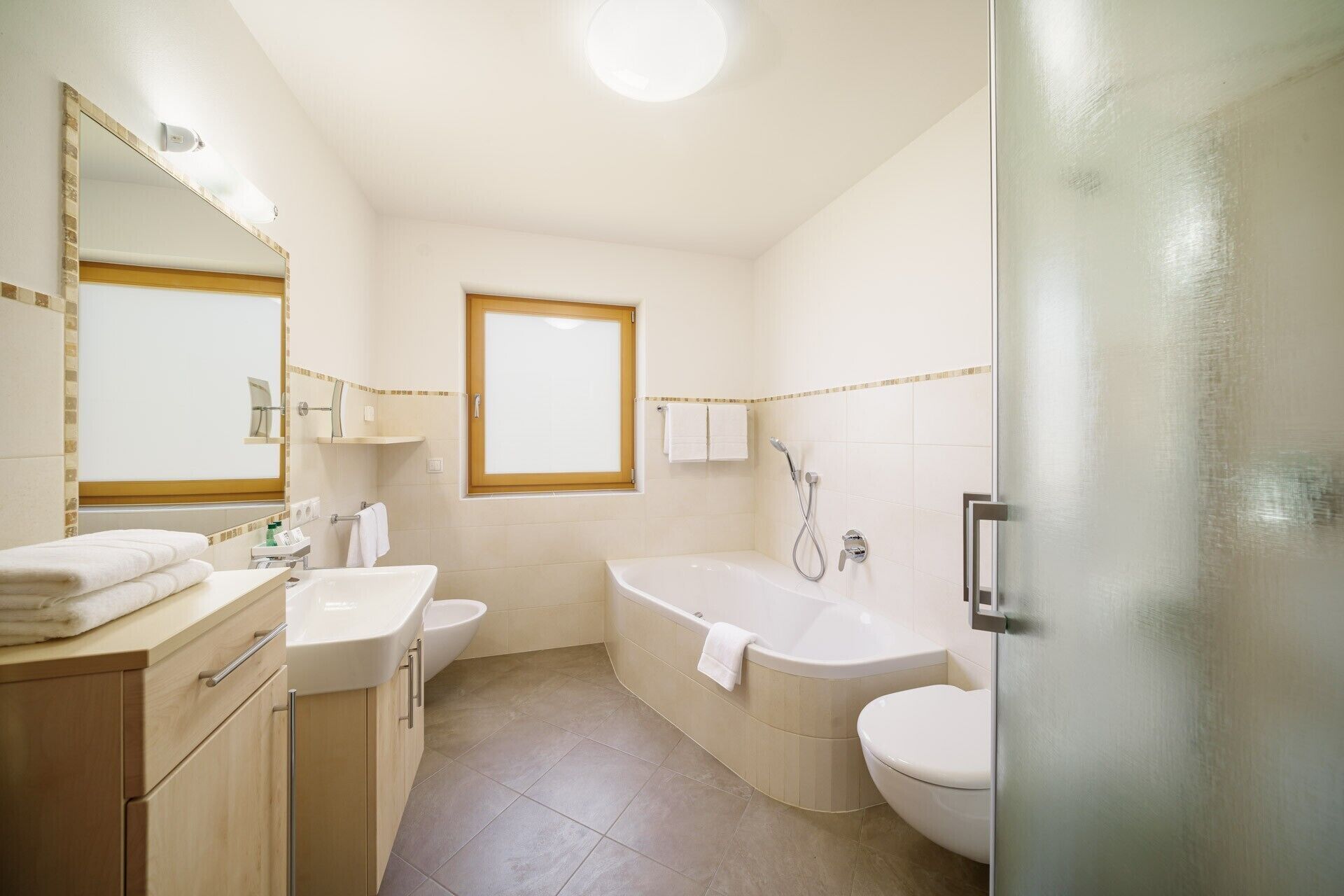 Bathtub, hair dryer, towels