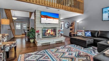 TV connectée, cheminée, jeux vidéo, livres