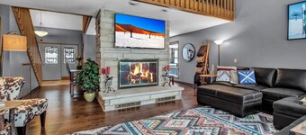 Best of both worlds; chalet located on a private lot in the pines and only 1 miles from the village!