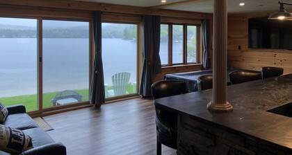 A quiet cove, the sunset and a sandy beach, on Lake Winnipesaukee