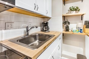 Fridge, microwave, oven, stovetop - Southern Chic Apt. on Forsyth Park w/ Parking, No Stairs by Lucky Savannah (Savannah)