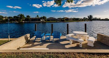 Sunny Waterfront Oasis: Your Dream Pool Home with Southern Exposure