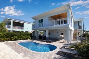 Outdoor pool, a heated pool - Beautiful 4 Bedroom/3 Bath Home w/Private Pool,40 ft. Dock near Sombrero Beach! (Marathon)
