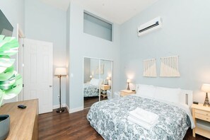 1 bedroom, desk, iron/ironing board, travel crib