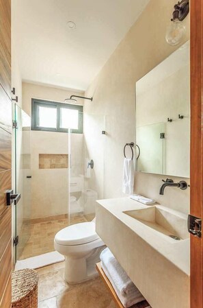 Bathtub, hair dryer, towels, soap
