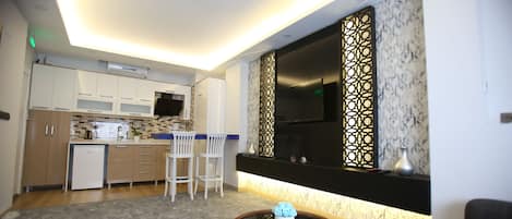 Family Condo | Living area | 60-inch Smart TV with satellite channels, TV