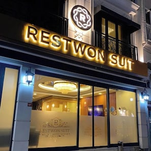 A building with a sign that reads 'RESTWON SUIT' and a logo above it. - Restwon Suit Hotel (Istanbul)