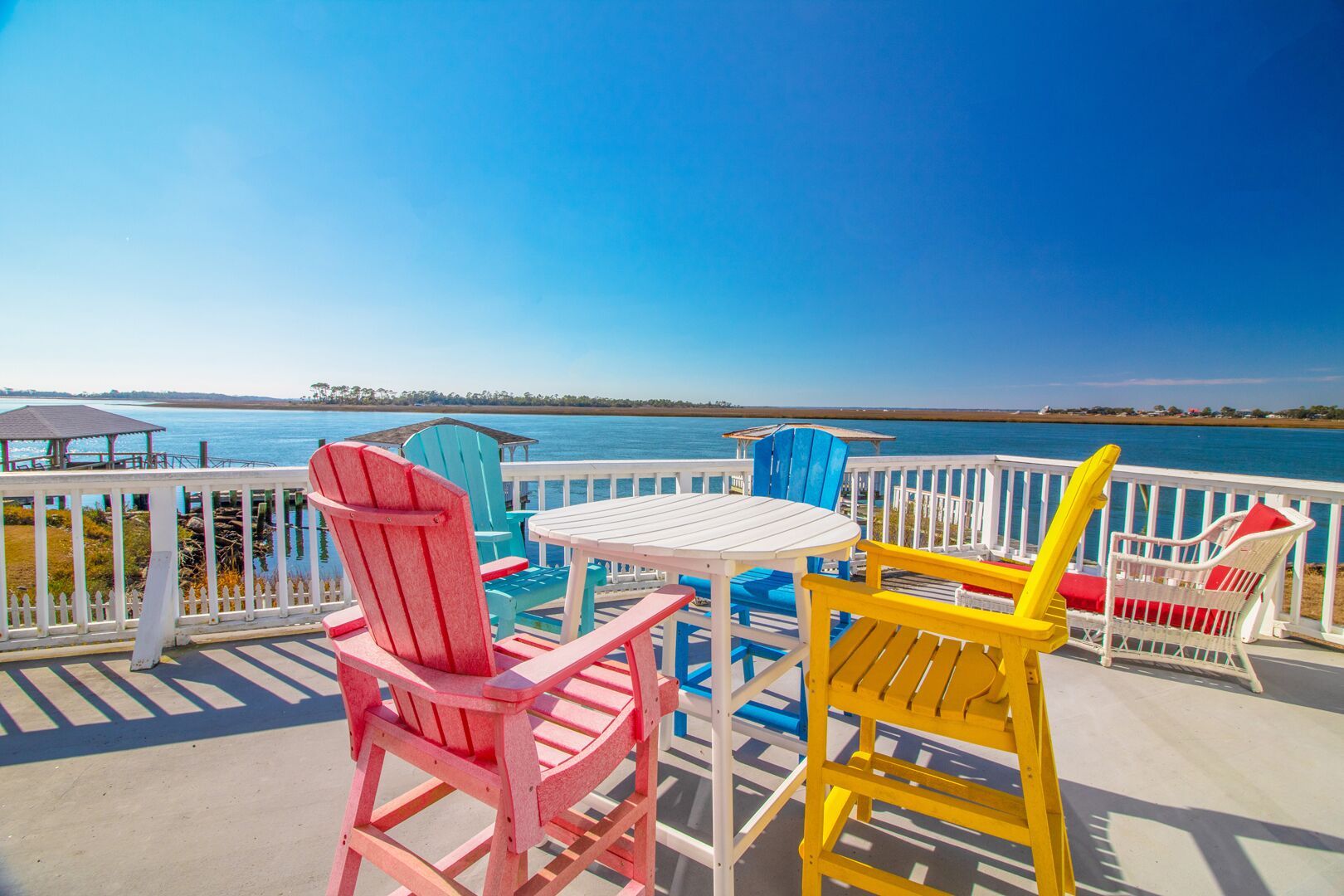 Restored Beach Cottage on the back river with private covered floating gazebo and dock.