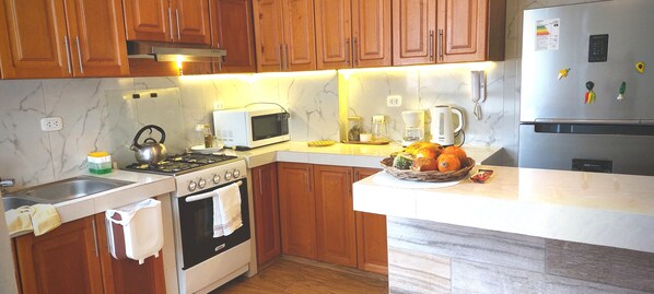 Fridge, microwave, oven, stovetop