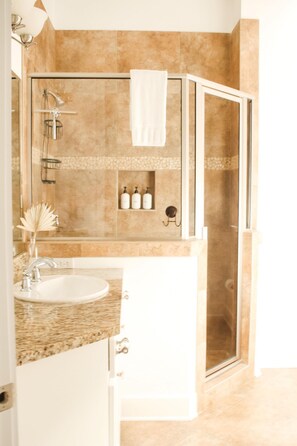 Bathtub, hair dryer, towels, soap