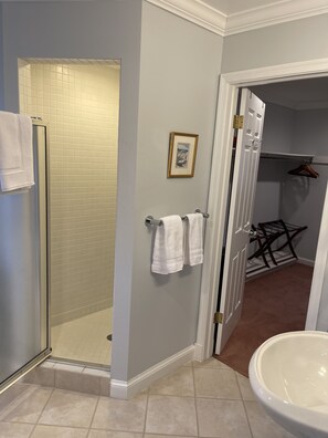 Combined shower/tub, hair dryer, towels, soap