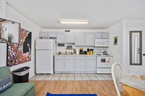 Fridge, oven, coffee/tea maker, cookware/dishes/utensils