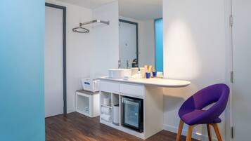 Down duvets, memory-foam beds, in-room safe, desk