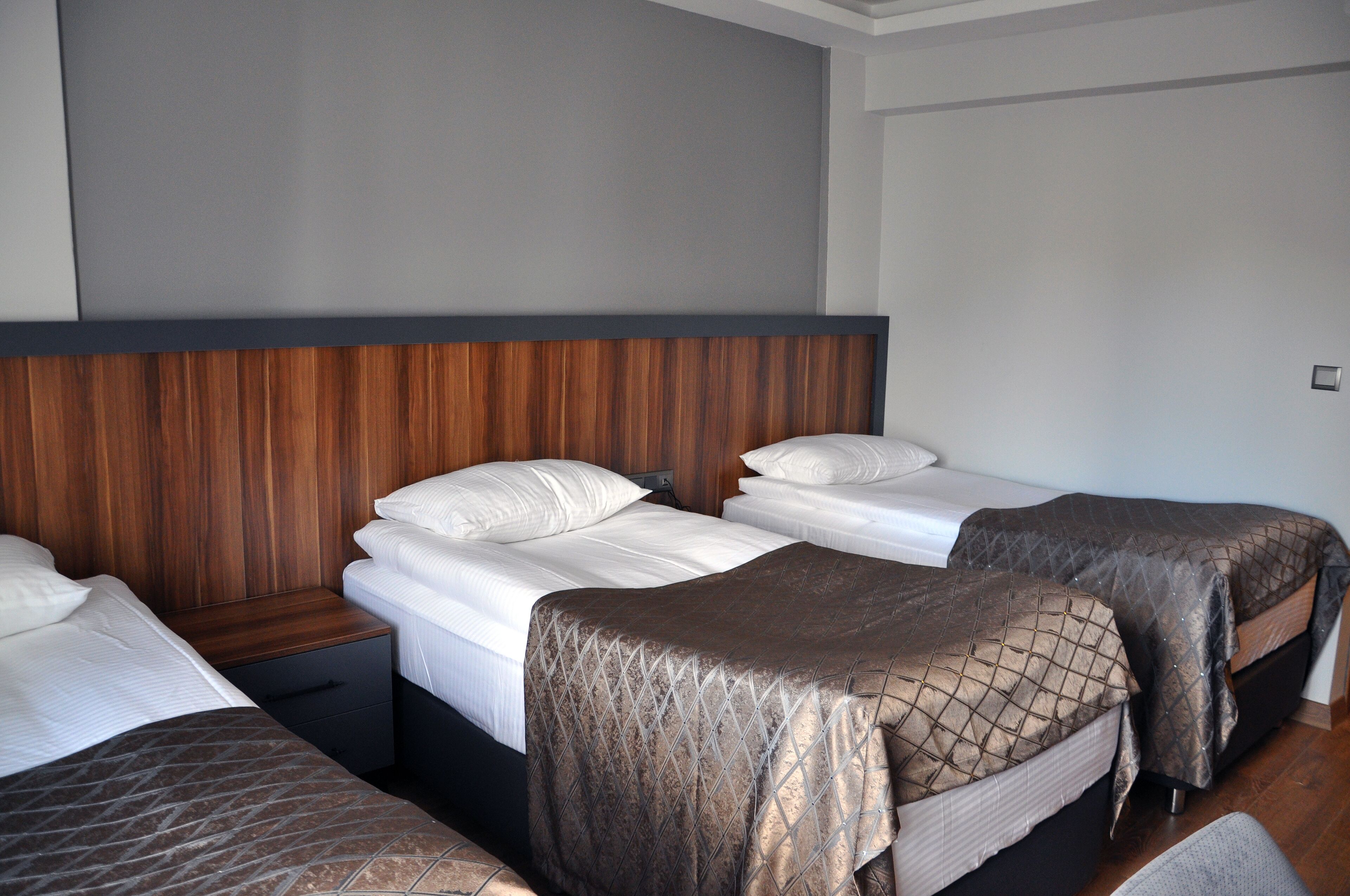 classic triple room | premium bedding, free minibar, desk, laptop workspace