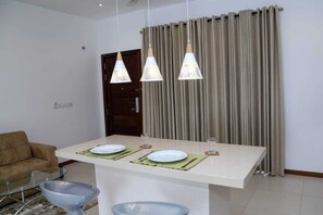 Deluxe Apartment, 2 Bedrooms, Balcony, City View | In-room dining
