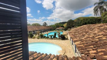 Outdoor pool, pool umbrellas, sun loungers