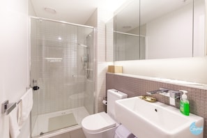 Shower, hair dryer, towels, soap