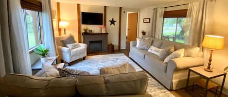 Smart TV, fireplace, DVD player, books
