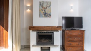 Apartamento superior | Área de estar