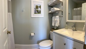 Combined shower/bathtub, hair dryer, towels, soap