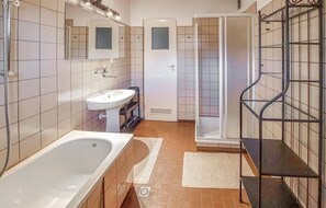 Combined shower/tub, hair dryer